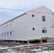 Contractors finish moving World War II-era barracks buildings to new foundations at Fort McCoy