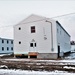 Contractors finish moving World War II-era barracks buildings to new foundations at Fort McCoy