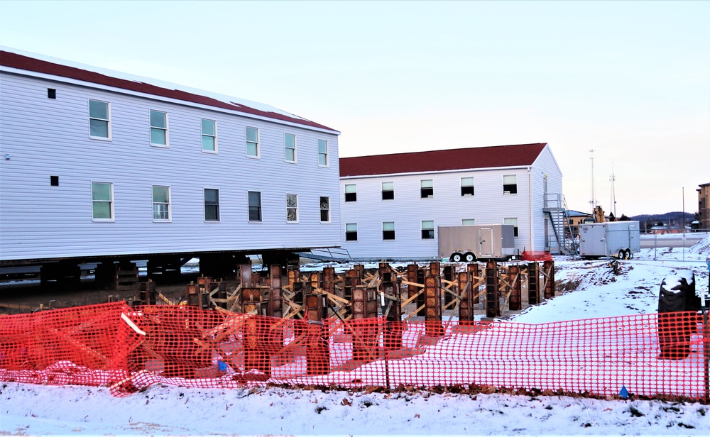 Contractors finish moving World War II-era barracks buildings to new foundations at Fort McCoy