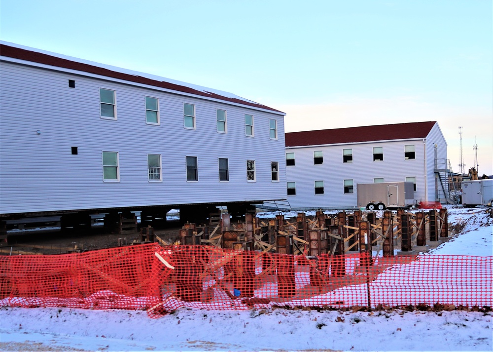 Contractors finish moving World War II-era barracks buildings to new foundations at Fort McCoy