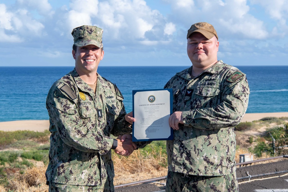 Pacific Missile Range Facility Hosts a Reenlistment Ceremony for OS2 Stephen Pine.