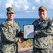 Pacific Missile Range Facility Hosts a Reenlistment Ceremony for OS2 Stephen Pine.