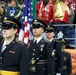 Washington National Guard service members service color guard during Thanksgiving game at Lumen Field