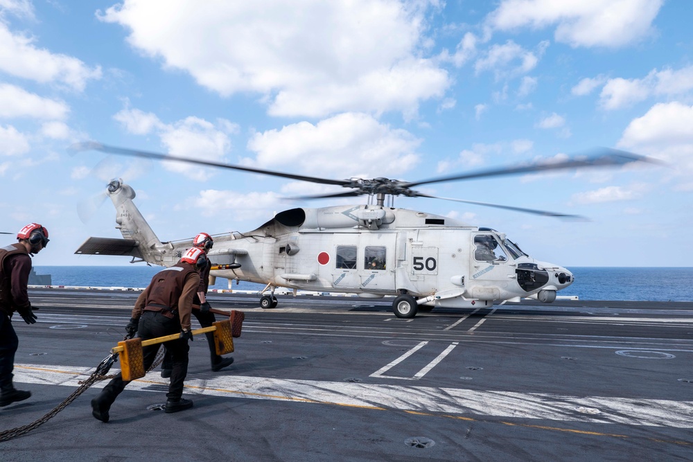 USS Carl Vinson (CVN 70) Sailors Conduct Helicopter Flight Operations in the Philippine Sea