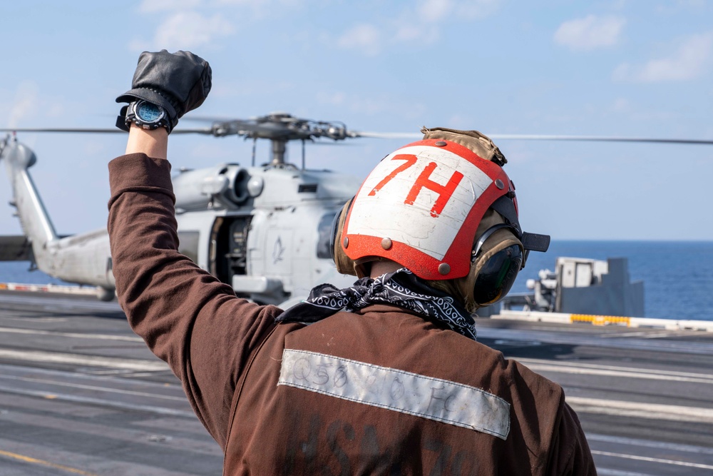 USS Carl Vinson (CVN 70) Sailors Conduct Helicopter Flight Operations in the Philippine Sea