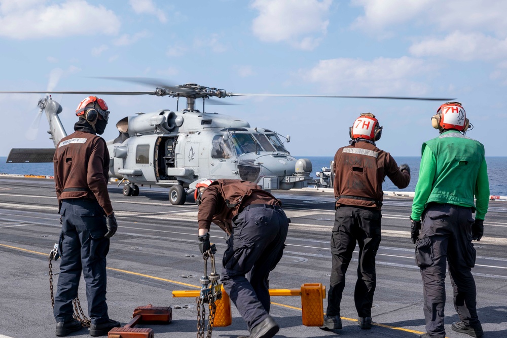 USS Carl Vinson (CVN 70) Sailors Conduct Helicopter Flight Operations in the Philippine Sea