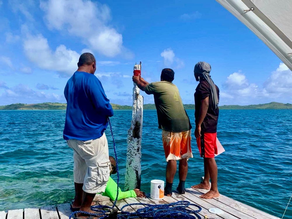 Ngaraard State public works crew revitalizes shoreside channel markers