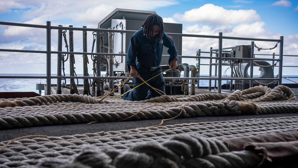 USS Carl Vinson (CVN 70) Sailor Conducts Mooring Line Maintenance