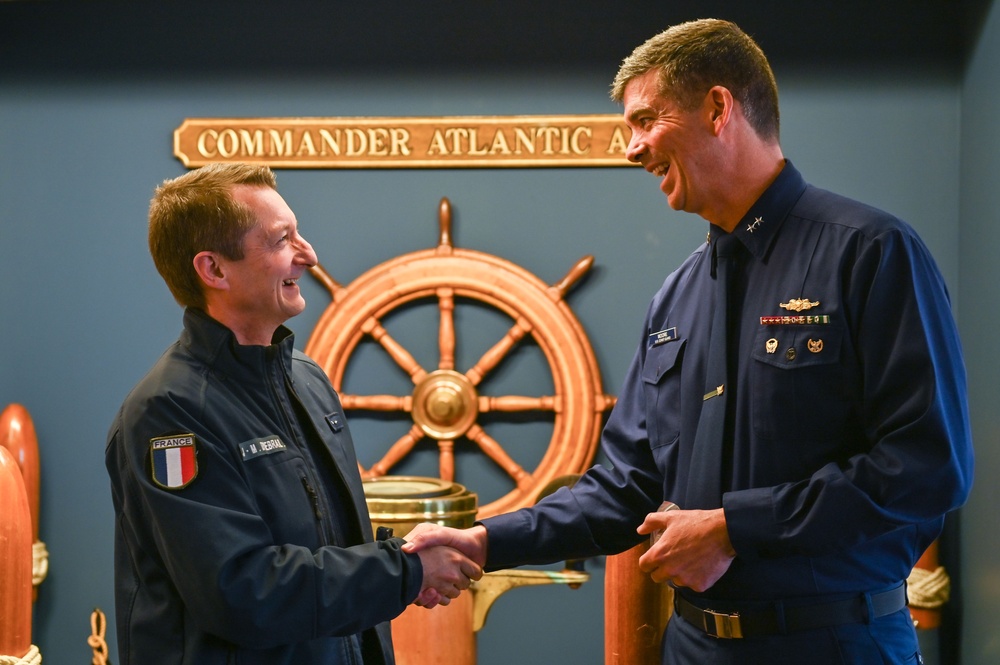 U.S. Coast Guard Rear Admiral Nathan Moore, Deputy Atlantic Area Commander welcomes Rear Admiral Jean-Marin d’Hébrail, Deputy Commander of the French Commander in Chief for the Atlantic Ocean