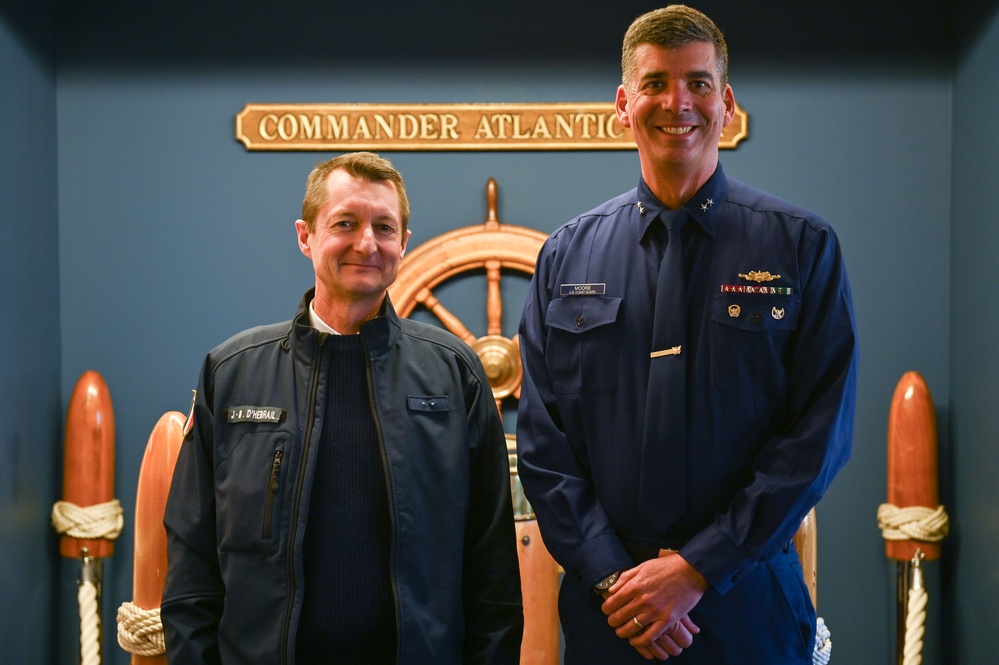 U.S. Coast Guard Rear Admiral Nathan Moore, Deputy Atlantic Area Commander welcomes Rear Admiral Jean-Marin d’Hébrail, Deputy Commander of the French Commander in Chief for the Atlantic Ocean