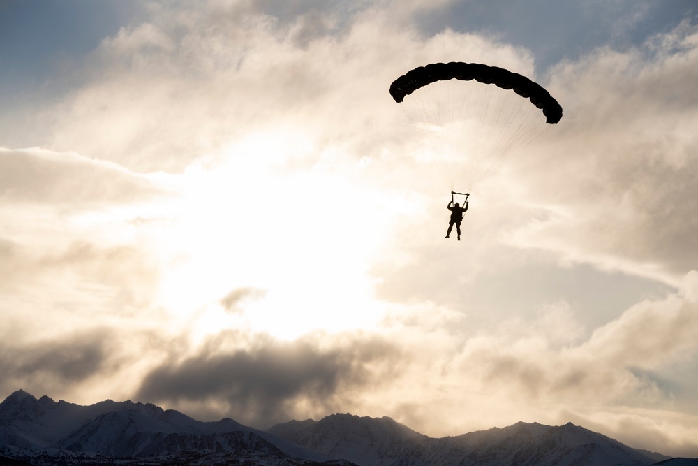 Air Force special warfare Airmen, Alaska Air National Guard aviators, and Army paratroopers conduct airborne training at JBER