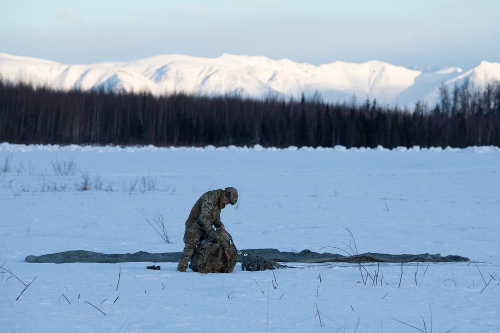 Air Force special warfare Airmen, Alaska Air National Guard aviators, and Army paratroopers conduct airborne training at JBER