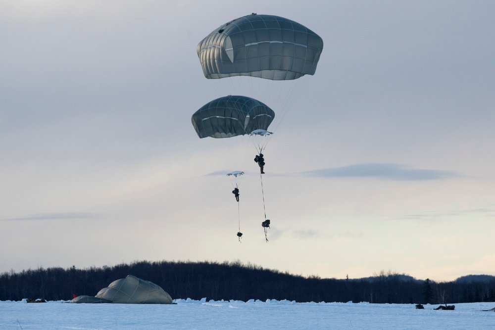 Air Force special warfare Airmen, Alaska Air National Guard aviators, and Army paratroopers conduct airborne training at JBER