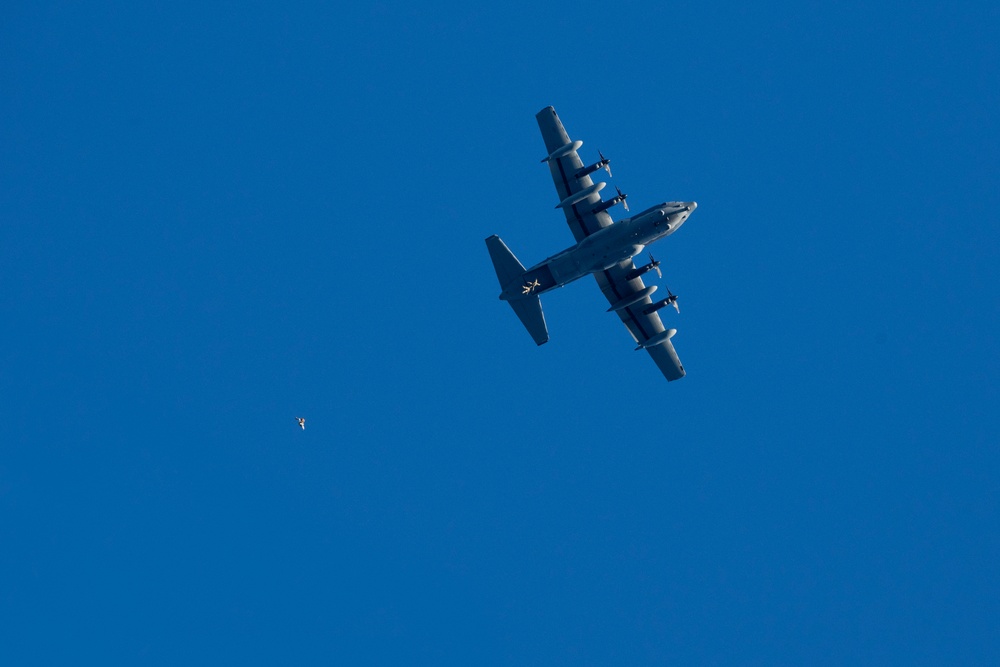 Air Force special warfare Airmen, Alaska Air National Guard aviators, and Army paratroopers conduct airborne training at JBER