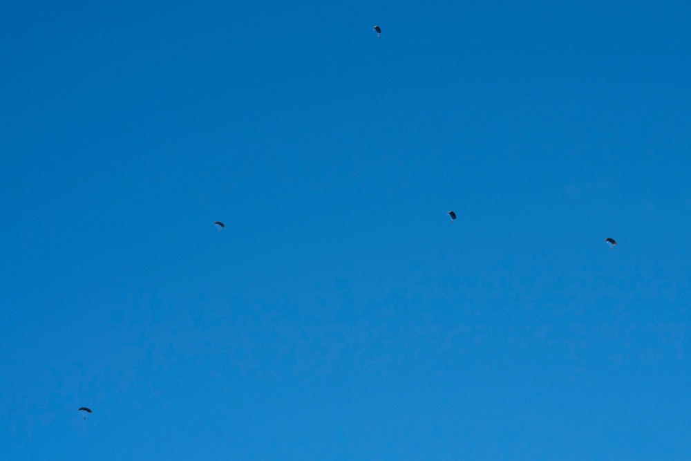 Air Force special warfare Airmen, Alaska Air National Guard aviators, and Army paratroopers conduct airborne training at JBER