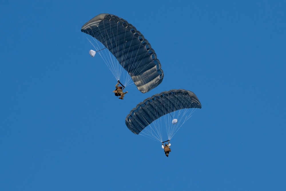 Air Force special warfare Airmen, Alaska Air National Guard aviators, and Army paratroopers conduct airborne training at JBER