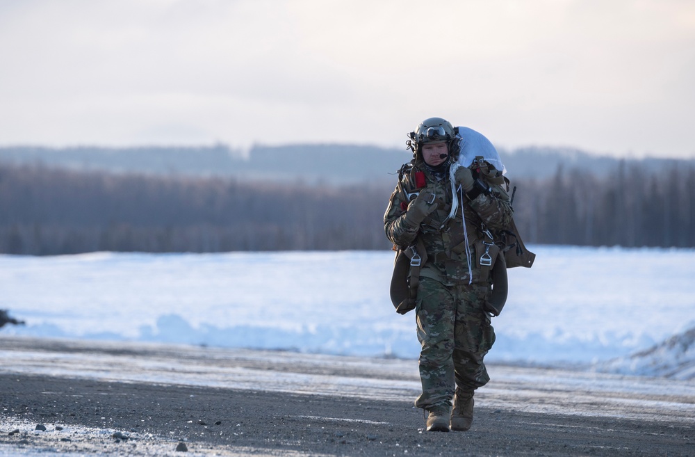 Air Force special warfare Airmen, Alaska Air National Guard aviators, and Army paratroopers conduct airborne training at JBER