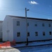 Contractors finish moving World War II-era barracks buildings to new foundations at Fort McCoy