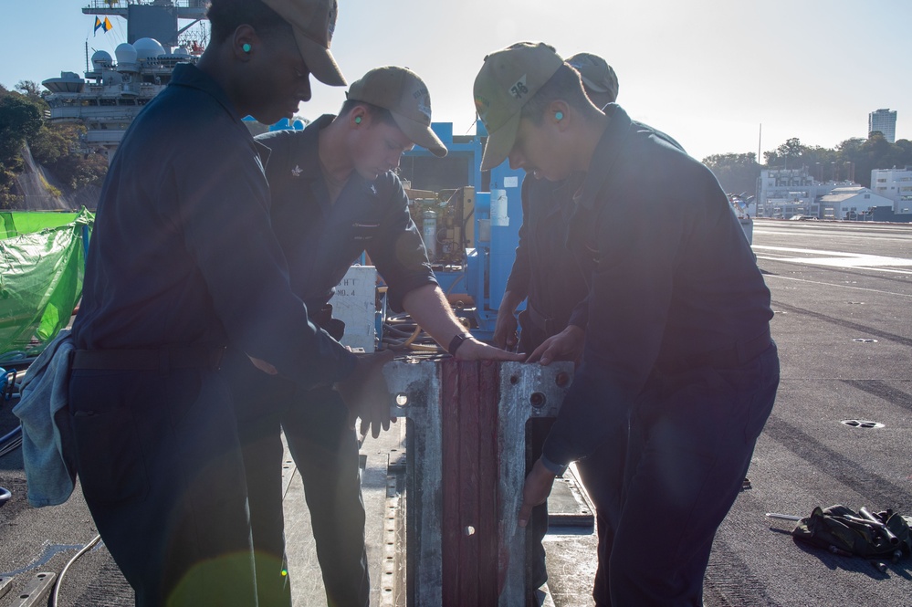 USS Ronald Reagan (CVN 76) Sailors perform maintenance