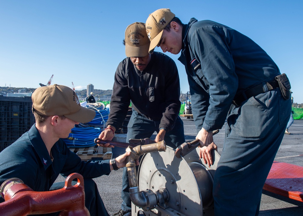 USS Ronald Reagan (CVN 76) Sailors perform maintenance