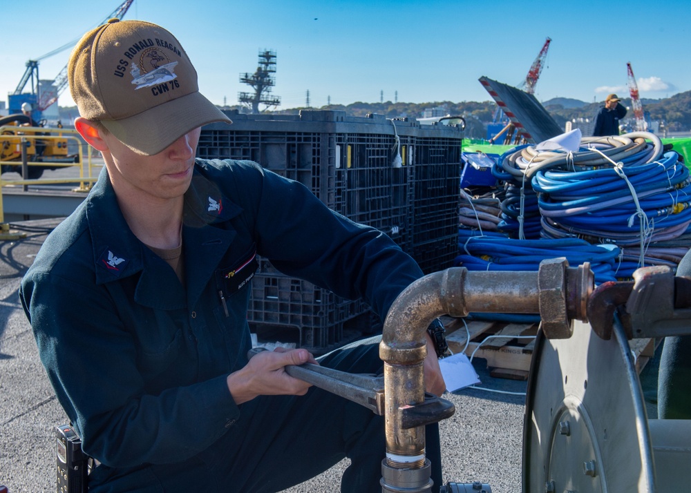 USS Ronald Reagan (CVN 76) Sailors perform maintenance