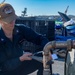 USS Ronald Reagan (CVN 76) Sailors perform maintenance