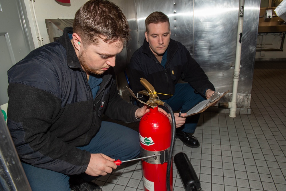 USS Ronald Reagan (CVN 76) Sailors perform maintenance and prepare for 3MI
