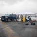 Experts prepare a U.S. Navy P-8A Poseidon in Kaneohe Bay for Salvage Operations