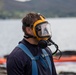 Experts prepare a U.S. Navy P-8A Poseidon in Kaneohe Bay for Salvage Operations