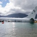 Experts prepare a U.S. Navy P-8A Poseidon in Kaneohe Bay for Salvage Operations