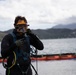 Experts prepare a U.S. Navy P-8A Poseidon in Kaneohe Bay for Salvage Operations