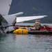 Experts prepare a U.S. Navy P-8A Poseidon in Kaneohe Bay for Salvage Operations