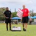 U.S. Army Soldiers from the 130th Engineer Brigade compete in corn hole