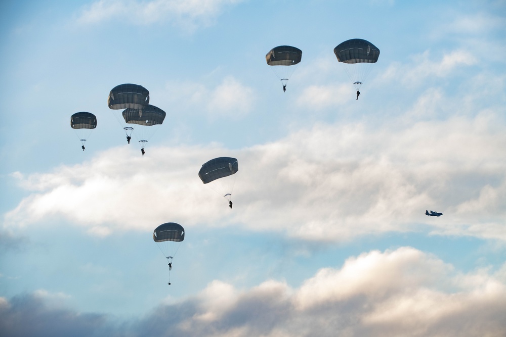 Air Force special warfare Airmen, Alaska Air National Guard aviators, and Army paratroopers conduct airborne training at JBER