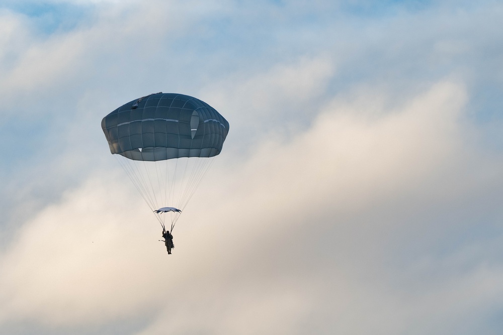 Air Force special warfare Airmen, Alaska Air National Guard aviators, and Army paratroopers conduct airborne training at JBER