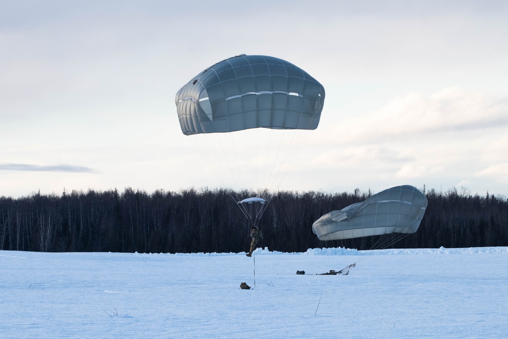 Air Force special warfare Airmen, Alaska Air National Guard aviators, and Army paratroopers conduct airborne training at JBER