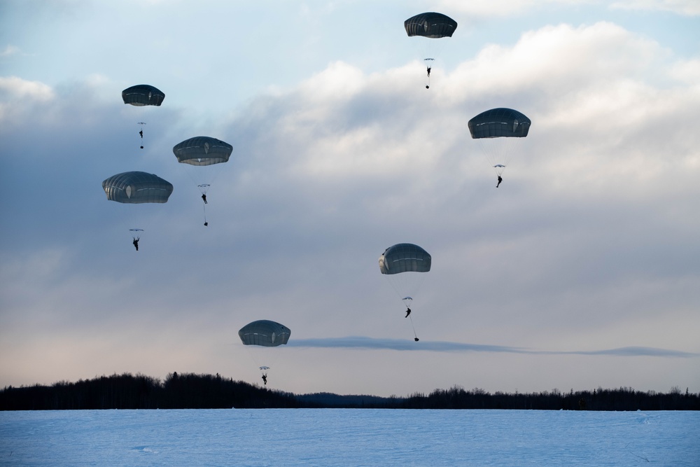 Air Force special warfare Airmen, Alaska Air National Guard aviators, and Army paratroopers conduct airborne training at JBER