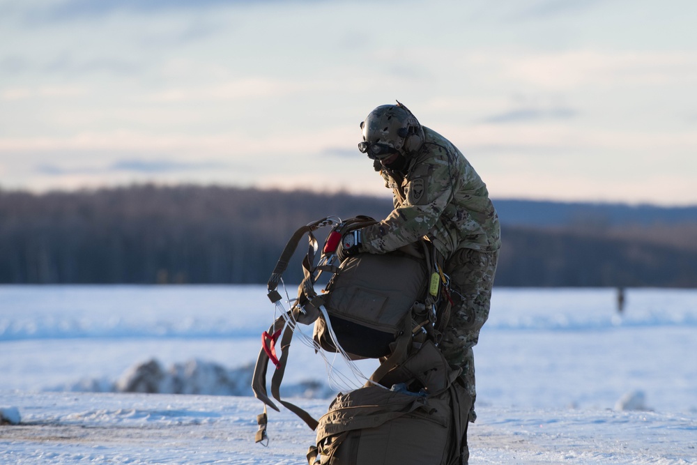 Air Force special warfare Airmen, Alaska Air National Guard aviators, and Army paratroopers conduct airborne training at JBER