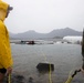 Experts prepare a U.S. Navy P-8A Poseidon in Kaneohe Bay for Salvage Operations