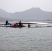 Experts prepare a U.S. Navy P-8A Poseidon in Kaneohe Bay for Salvage Operations