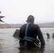 Experts prepare a U.S. Navy P-8A Poseidon in Kaneohe Bay for Salvage Operations