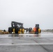 Experts prepare a U.S. Navy P-8A Poseidon in Kaneohe Bay for Salvage Operations