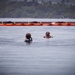 Experts Position Salvage Roller Bags During Salvage Preparation of U.S. Navy P-8A Poseidon in Kaneohe Bay.