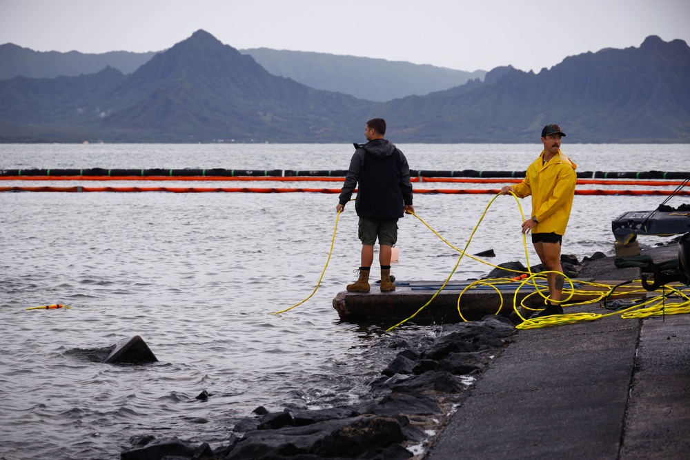Experts Position Salvage Roller Bags During Salvage Preparation of U.S. Navy P-8A Poseidon in Kaneohe Bay.
