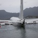 Experts Position Salvage Roller Bags During Salvage Preparation of U.S. Navy P-8A Poseidon in Kaneohe Bay