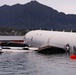 Experts Position Salvage Roller Bags During Salvage Preparation of U.S. Navy P-8A Poseidon in Kaneohe Bay