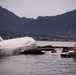 Experts Position Salvage Roller Bags During Salvage Preparation of U.S. Navy P-8A Poseidon in Kaneohe Bay