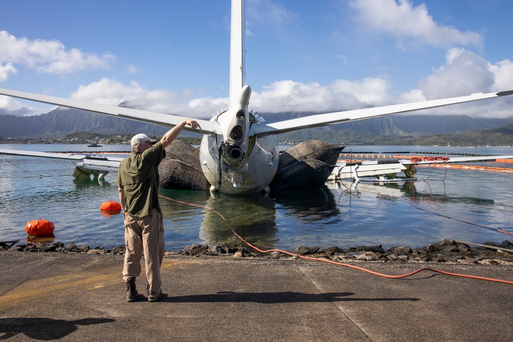 Salvage Team Positions U.S. Navy P-8A Poseidon for Extraction from Kaneohe Bay.