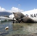 Salvage Team Positions U.S. Navy P-8A Poseidon for extraction from Kaneohe Bay.