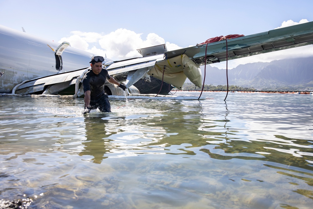 Experts Work to Extract U.S. Navy P-8A Poseidon From Kaneohe Bay